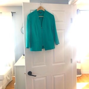 Turquoise/teal blazer.